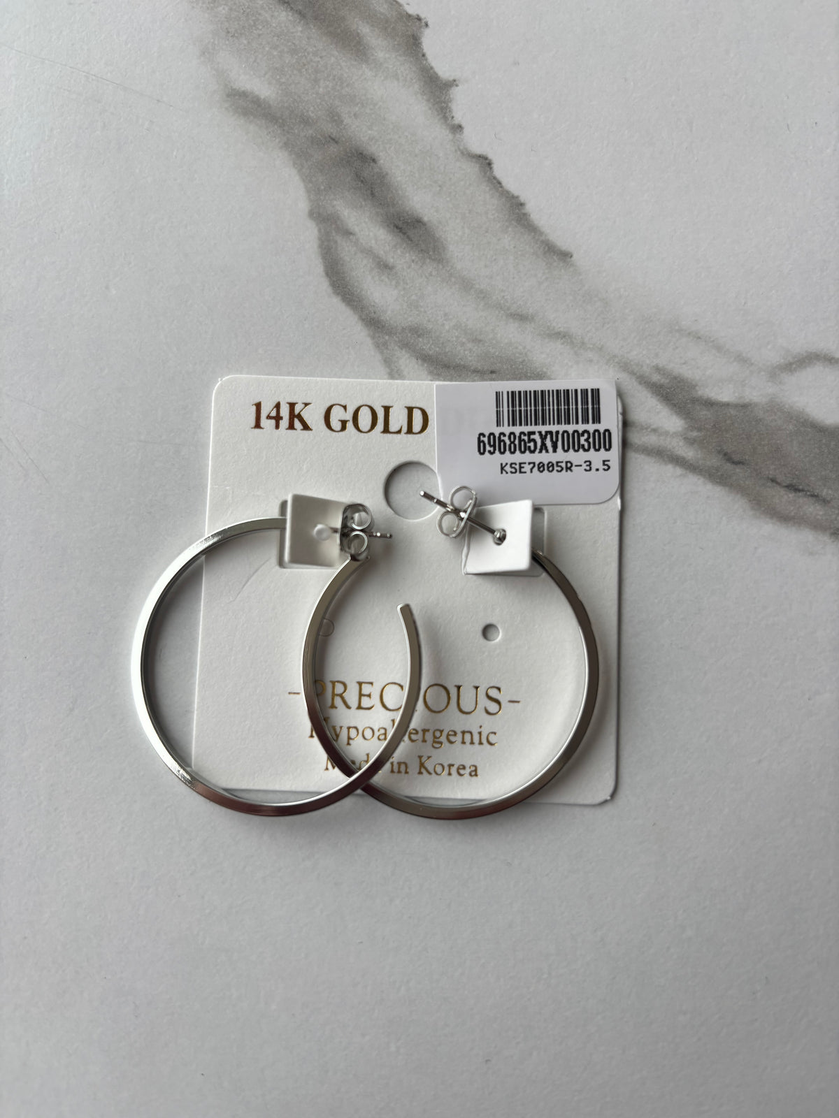 Thin and silver hoops